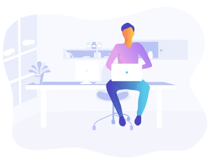 A young man on his laptop.