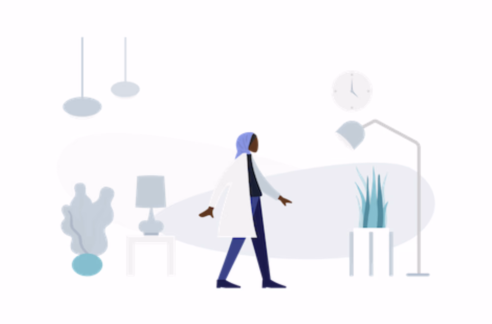 A medical professional walking around in her workplace.