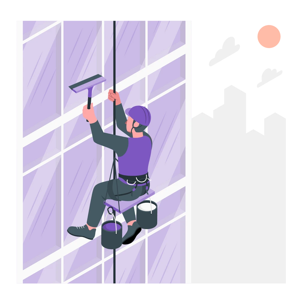A window cleaner suspended outside a tall building, cleaning its large windows. 